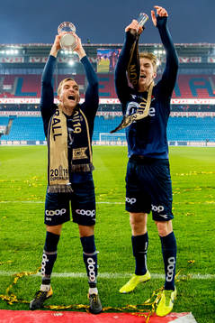Kristoffer Løkberg and Kristian Thorstvedt of Viking celebrate