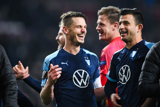Markus Rosenberg and Behrang Safari of Malmö FF celebrate