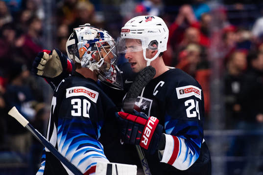 Goalkeeper Spencer Knight and Mattias Samuelsson of USA