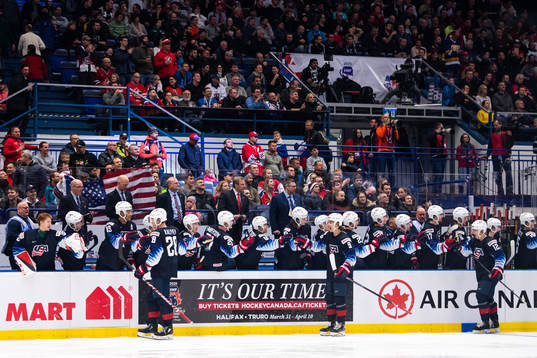 Arthur Kaliyev, Trevor Zegras and Jack Drury of USA