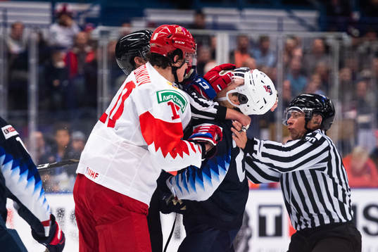 Dmitri Voronkov of Russia fights Parker Ford of USA