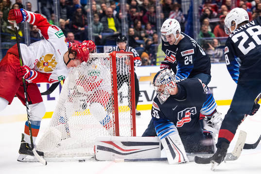 Dmitri Voronkov of Russia against goalkeeper Spencer Knight