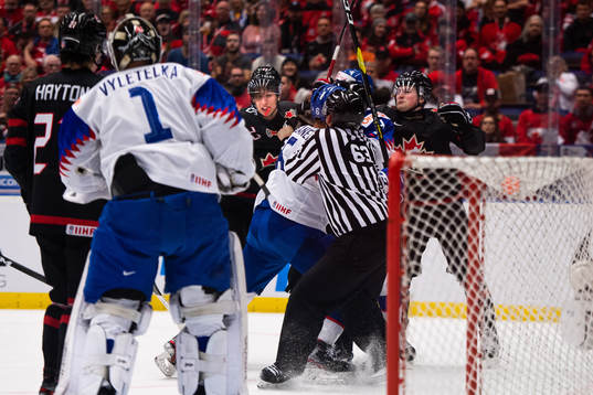 Dylan Cozens and Alexis Lafreniere of Canada