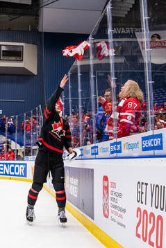 Dylan Cozens of Canada celebrates
