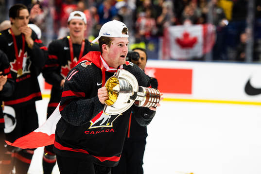 Alexis Lafreniere of Canada celebrates