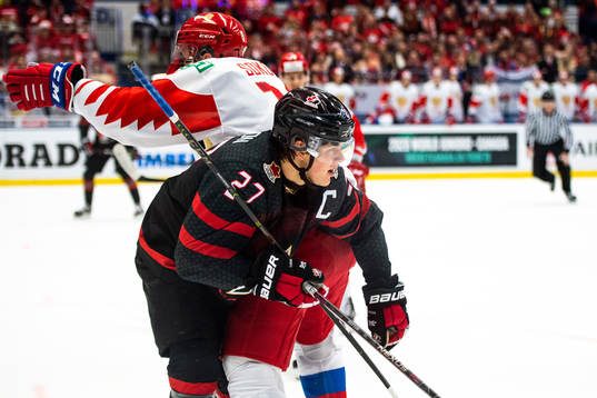 Yegor Sokolov of Russia against Barrett Hayton of Canada