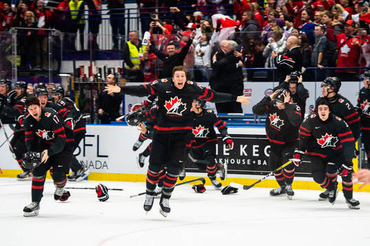 Bowen Byram of Canada celebrates