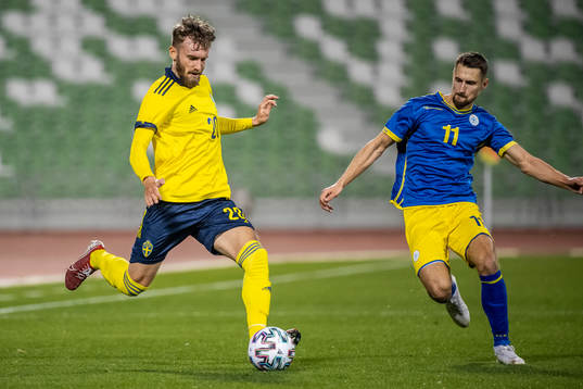 Simon Sandberg of Sweden and Elbasan Rashani of Kosovo during the international friendly football match between Sweden and Kosovo on January 9, 2020 in Doha.

