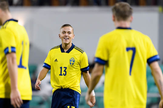 Jesper Karlsson of Sweden celebrates after the 1-0 goal by Simon Hedlund