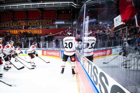 Joel Lundqvist of Frölunda celebrates with fans