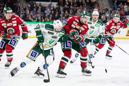 Färjestads Martin Johansson och Frölundas Mats Rosseli