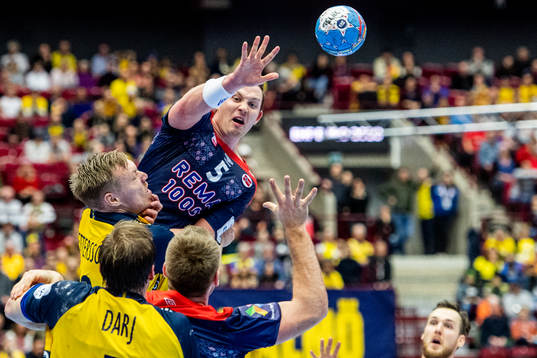 Sander Sagosen of Norway and Fredric Pettersson and Max