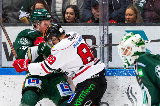 Färjestads Linus Arnesson och Örebros Joonas Rask