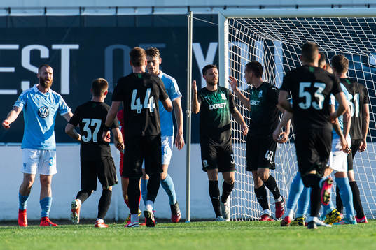 Marcus Berg of Krasnodar celebrates with team mates after 0-2