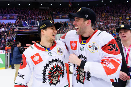 Rhett Rakhshani and Brandon Gormley celebrate