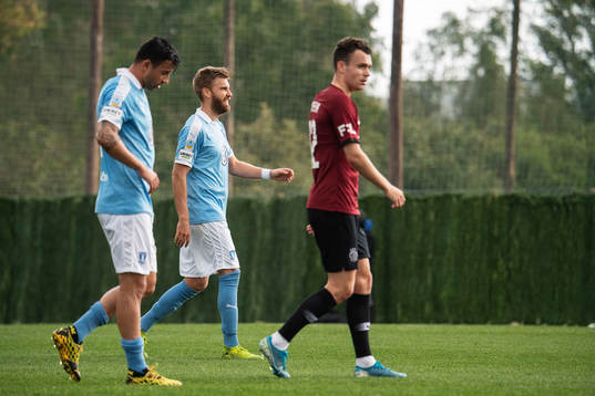 Behrang Safari and Rasmus Bengtsson of Malmö FF with Andreas Vindheim of Sparta Prauge