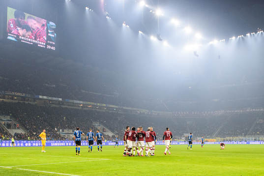 Players of Milan celebrate the 0-1 goal