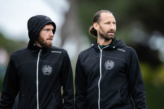 Simon Sandberg and goalkeeper Johan Wiland of Hammarby