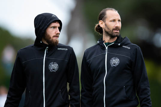 Simon Sandberg and goalkeeper Johan Wiland of Hammarby