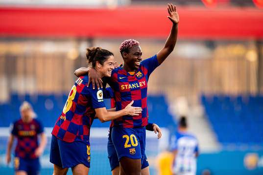 Asisat Oshoala of Barcelona celebrates with Marta Torrejon