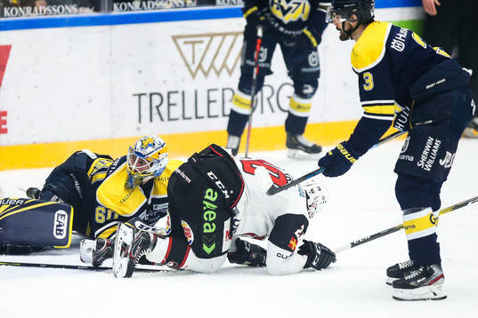 s målvakt Hugo Alnefelt och Malmö Redhawks Henrik Hetta