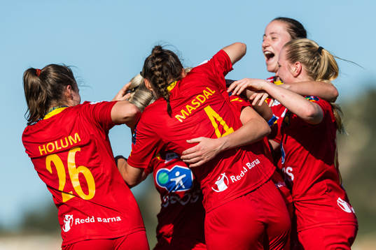 Rebecka Holum and Synne Masdal celebrate with team mates after 3-0 by Kamilla Aabel (not pictured)