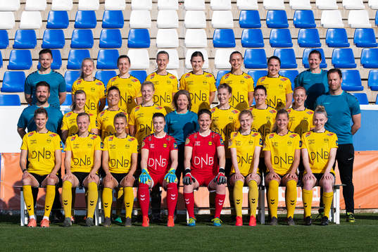  Tom Arne Stormo, Emilie Marie Aanes Woldvik, Simona Koren, Anja Sønstevold, Emilie Bosshard Haavi, Andrea Wilmann, Heidi Elisabeth Ellingsen and goalkeeper coach Bente Dalum Nordby. Middle row: Physio Jostein Liabø, Nora Eide Lie, Cathrine Høegh Dekkerhus, Sophie Román Haug, head coach Hege Riise, Mimmi Matilda Löfwenius Veum, Isabell Bachor, Cathrine Dahlström and assistant coach Knut Slatleim. Bottom row: Justine Vanhaevermaet, Mia Authen, Emilie Nautnes, goalkeeper Idun-Kristine Jørgensen, goalkeeper Ida Norstrøm, Malin Brenn, Nora Marie Egenes and Ina Gausdal.