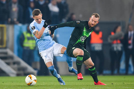 Sören Rieks of Malmö FF and Josip Brekalo of Wolfsburg