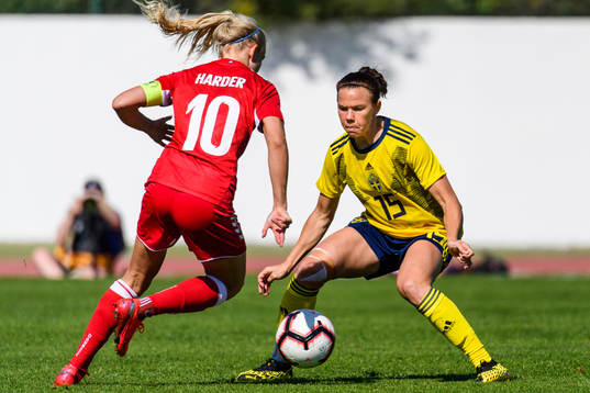 Jessica Samuelsson of Sweden guards Pernille Harder of