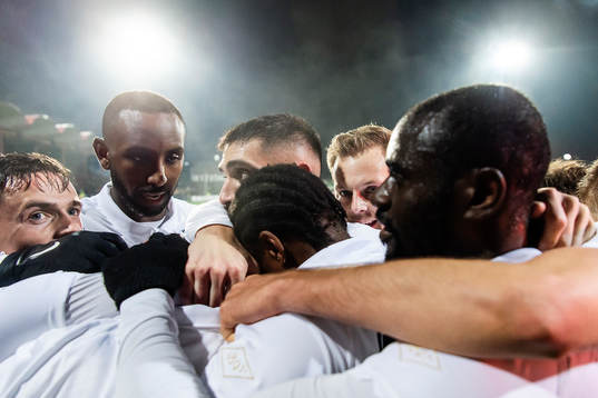 s Henok Goitom, Saku Ylätupa och Sebastian Larsson jublar efter 2-0 under fotbollmatchen i Svenska Cupen mellan AIK och Kalmar den 9 mars 2020 i Stockholm.
