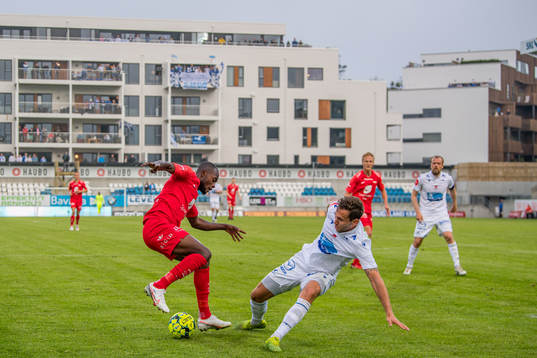 Gilbert Koomson of Brann and Benjamin Tiedemann Hansen of
