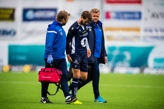 Christoffer Aasbak of Kristiansund leaves the pitch with an