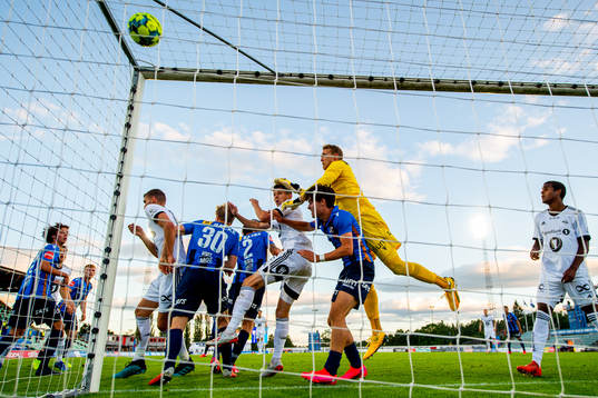 Gustav Valsvik of Rosenborg scores the 0-1 goal behind teammate Torgeir Børven and goalkeeper Marcus Sandberg of Stabæk