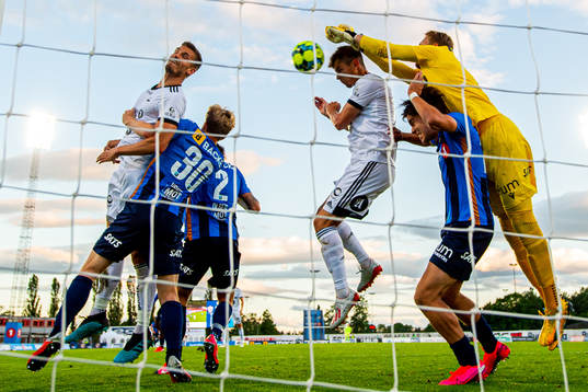 Gustav Valsvik of Rosenborg scores the 0-1 goal behind teammate Torgeir Børven and goalkeeper Marcus Sandberg of Stabæk