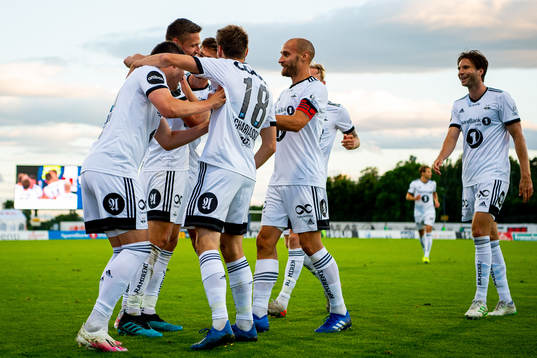 Gustav Valsvik of Rosenborg celebrates with Kristoffer Zachariassen, Tore Reginiussen, Marius Lundemo and teammates after scoring 0-1