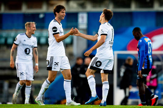 Kristoffer Zachariassen of Rosenborg celebrates with teammate Marius Lundemo after scoring 0-3