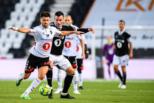 Vebjørn Hoff of Odd and Dino Islamovic of Rosenborg