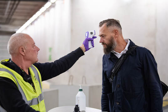 Swedish journalist Olof Lundh has his temperature checked ahead of entering the venue of the Swedish national football team’s press conference on August 31, 2020 in Stockholm.
