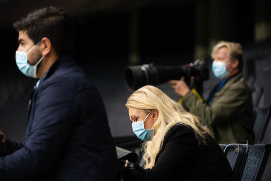 Members of media, including Jane Björck of SVT, wearing