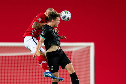 Tore Reginiussen of Norway and Michael Gregoritsch of