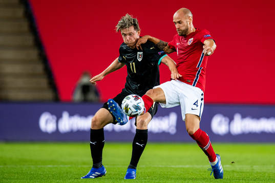 Michael Gregoritsch of Austria and Tore Reginiussen of