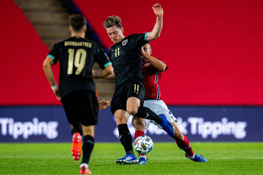 Michael Gregoritsch of Austria and Tore Reginiussen of