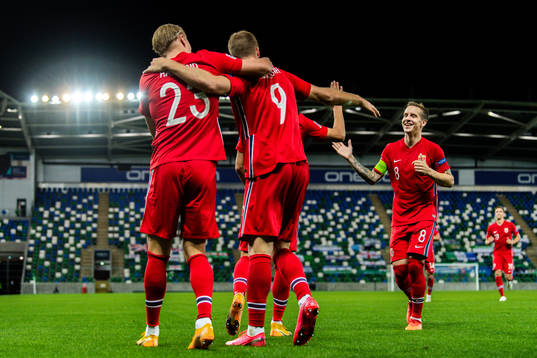 Erling Braut Haaland, Alexander Sørloth and Stefan Johansen of Norway celebrate the 1-4 goal
