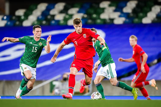 Jordan Thompson of Northern Ireland and Alexander Sørloth