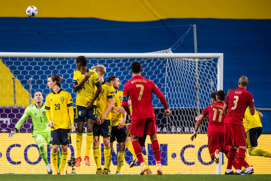 Cristiano Ronaldo of Portugal scores the 0-1 goal behind