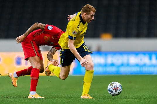 Joao Cancelo of Portugal and Dejan Kulusevski of Sweden