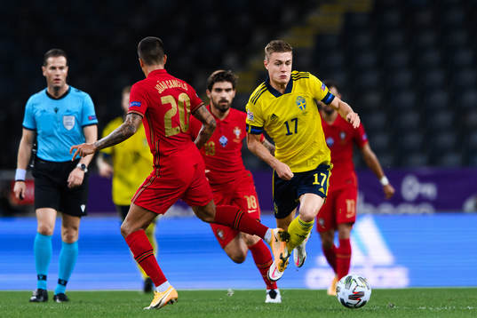 Joao Cancelo of Portugal and Mattias Svanberg of Sweden