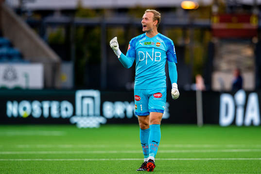 Goalkeeper Viljar Myhra of Strømsgodset celebrates after 3-1