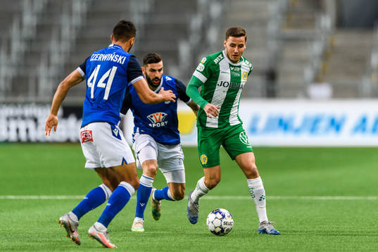 Jeppe Andersen of Hammarby against Alan Czerwinski and