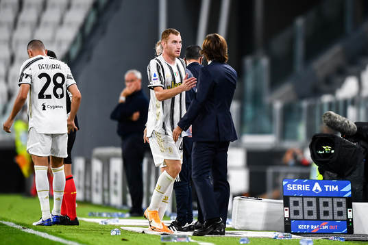 Dejan Kulusevski and head coach Andrea Pirlo of Juventus